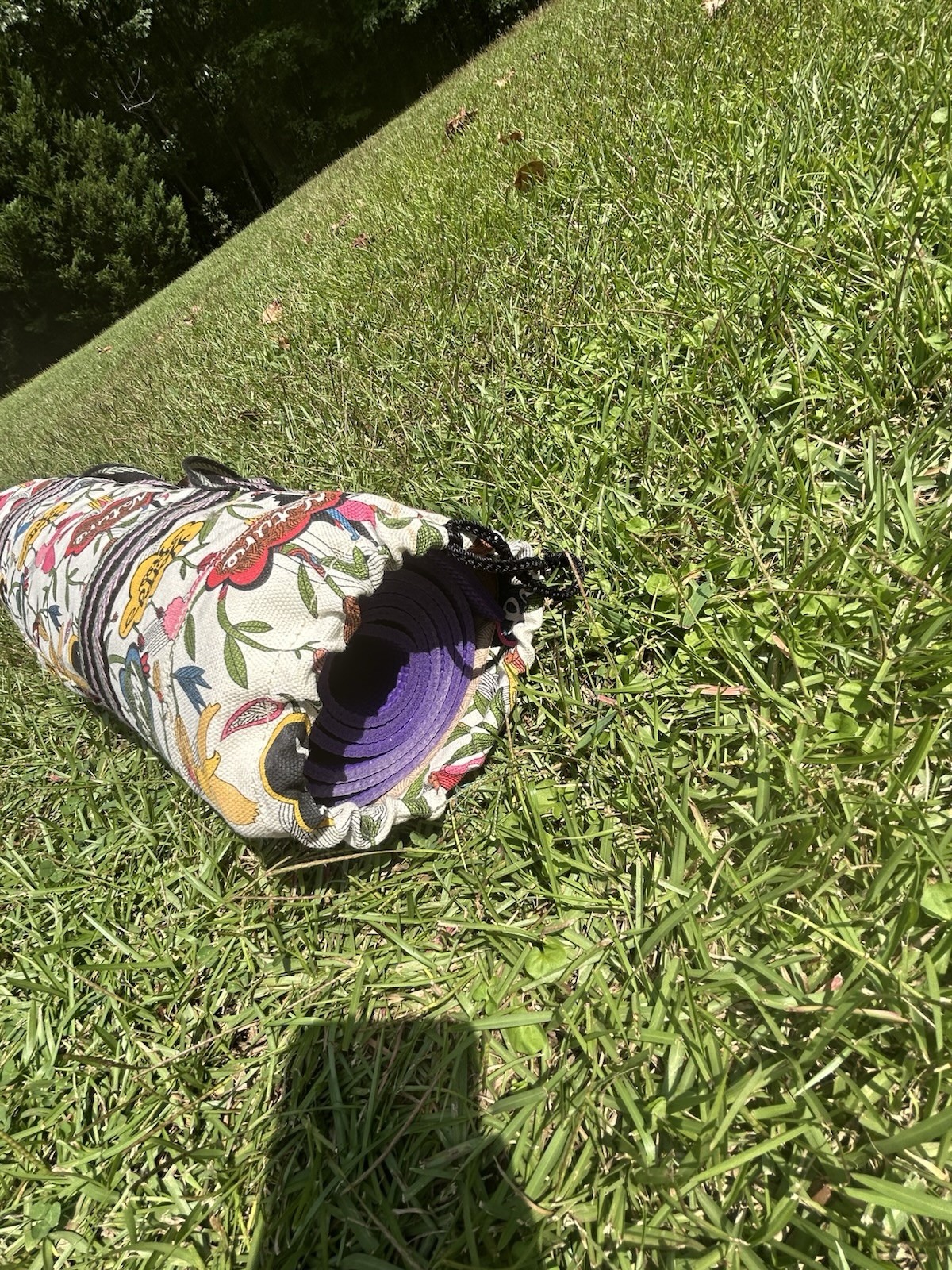 Sakroots Peace Yoga Exercise Mat Tote Duffle Bag Over Shoulder With A Purple Mat