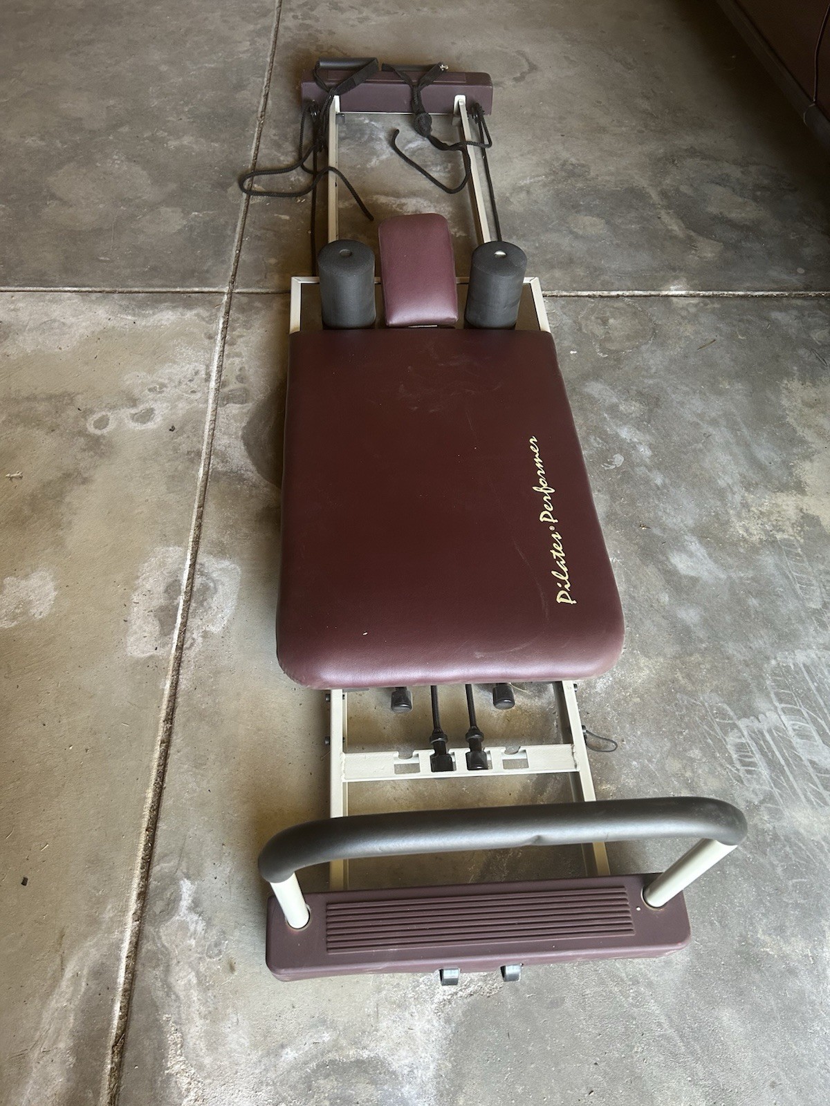 Pilates reformer machine for full-body core and flexibility training.