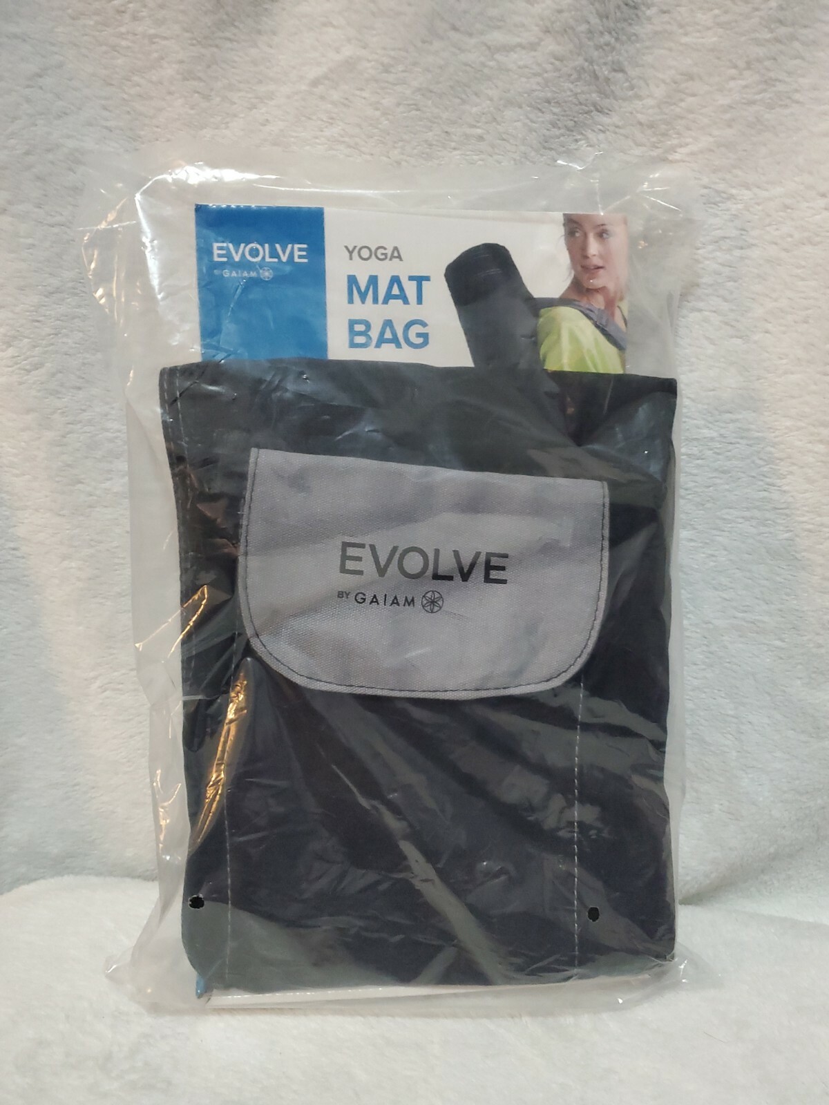 Evolve by Gaiam black yoga mat bag with shoulder strap, pockets, & full zip