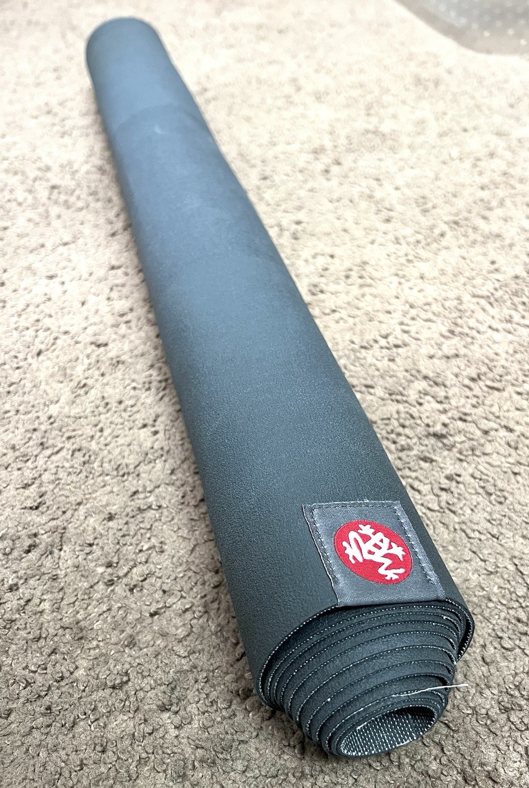 Manduka EKO Superlite Yoga Mat for Travel Lightweight Easy Roll & Fold Charocal