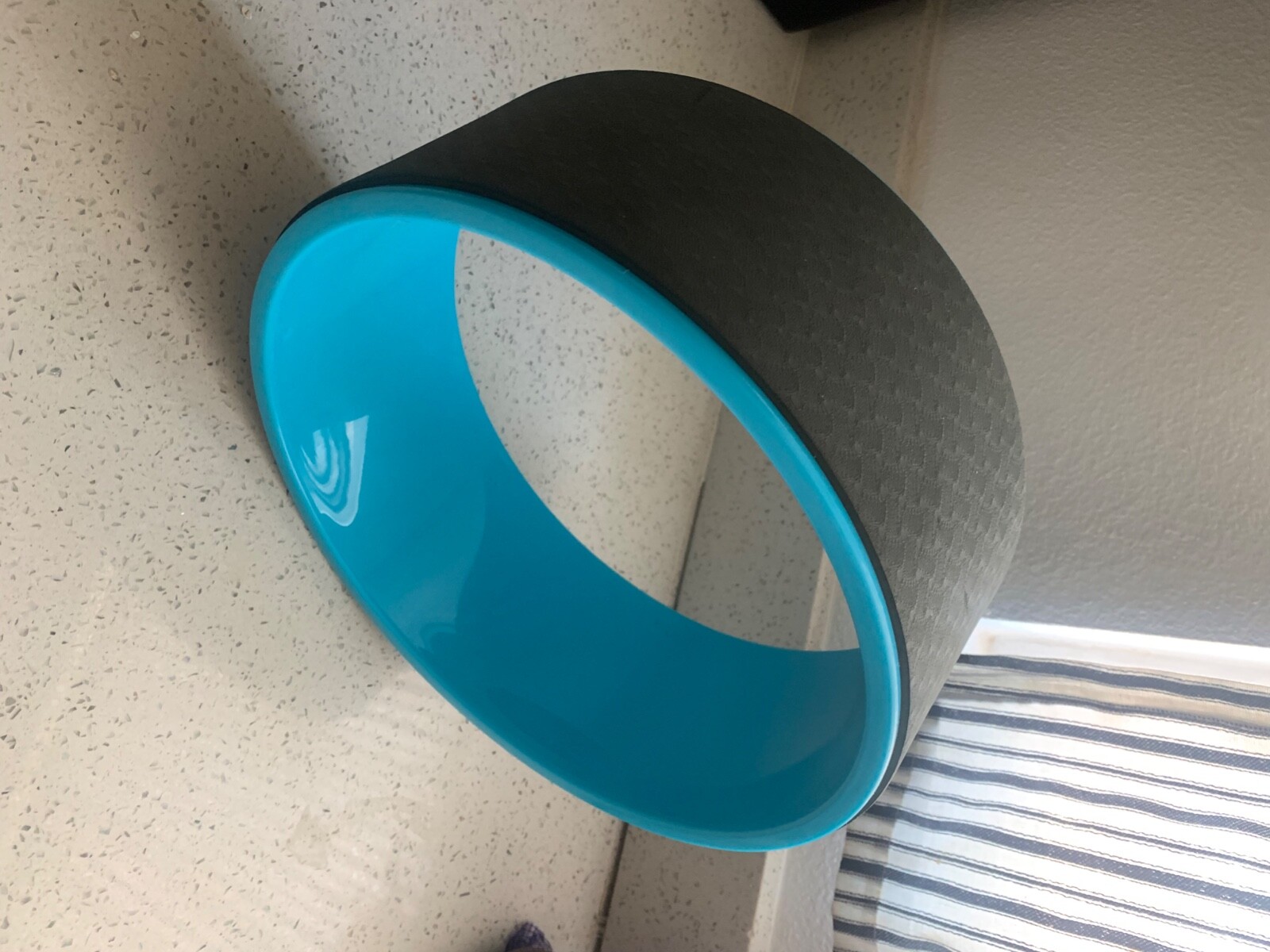Slightly Used Blue Re-spin Yoga Wheel for Stretching and Back Pain